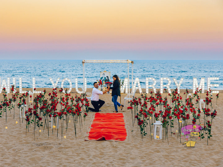 POP THE QUESTION ON THE SHORE